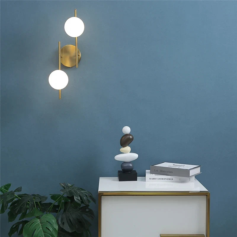 Astra Frosted Globe Gold Wall Light