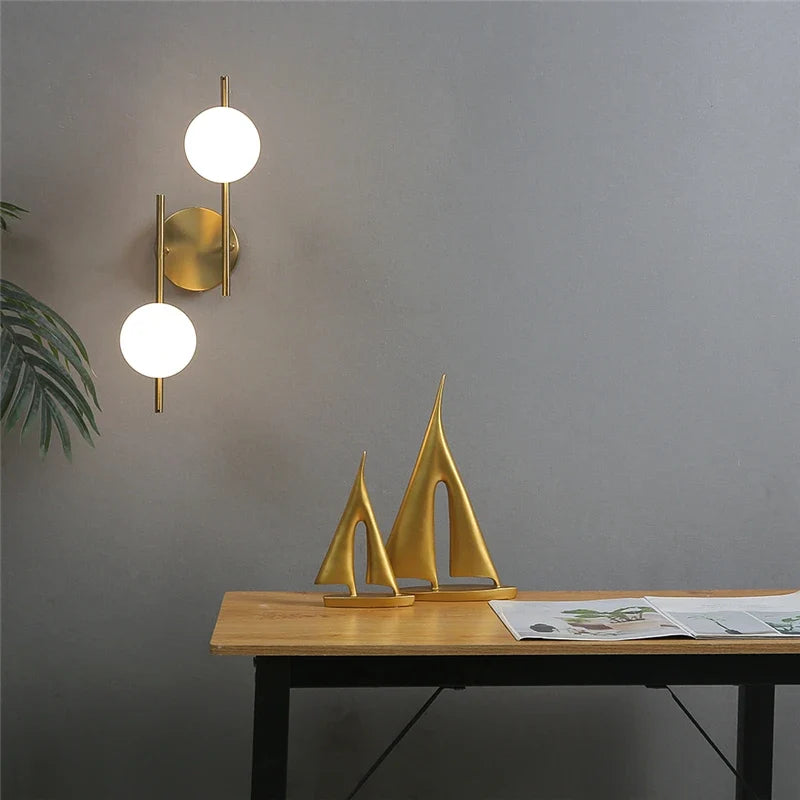Astra Frosted Globe Gold Wall Light