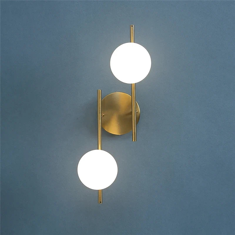 Astra Frosted Globe Gold Wall Light